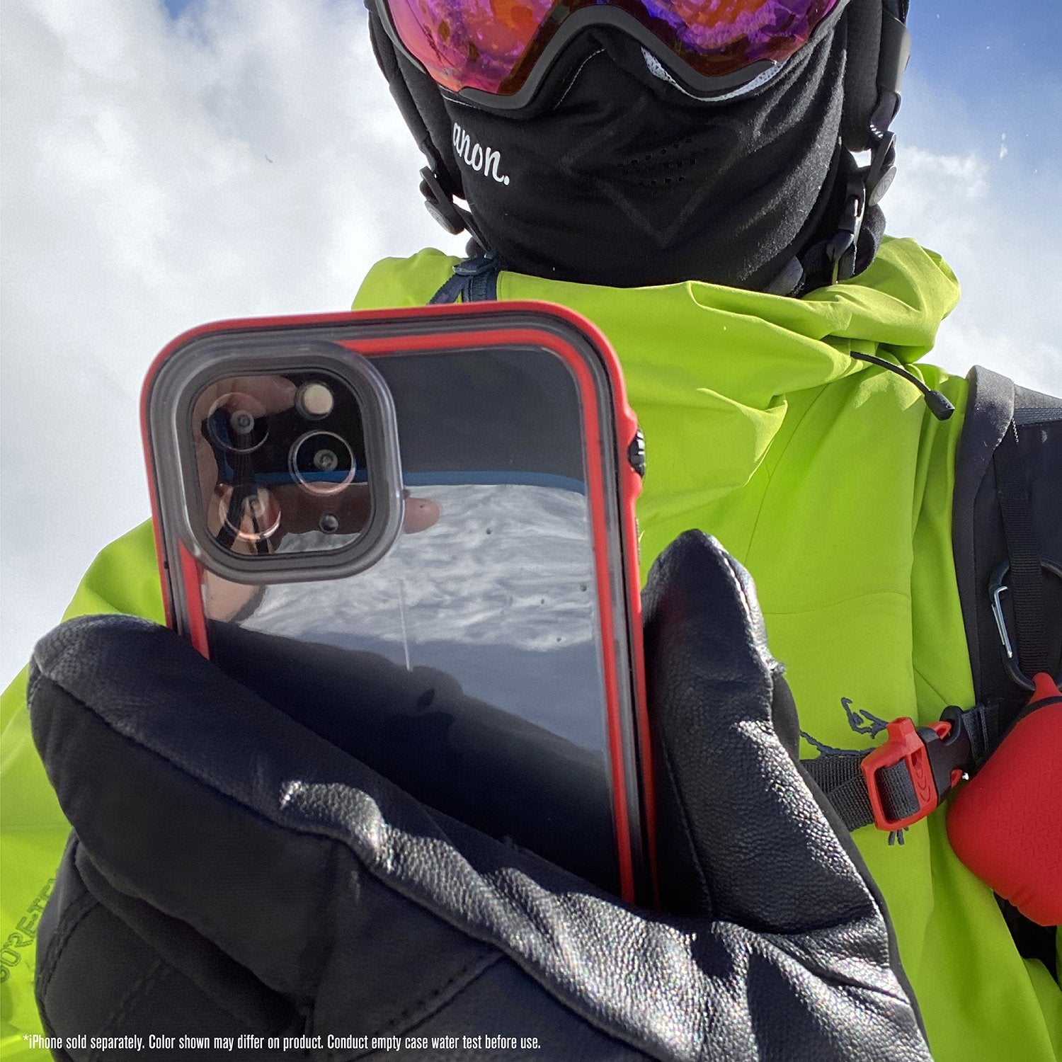  Catalyst iphone 11 pro max waterproof case showing the man holding the phone with case in flame red