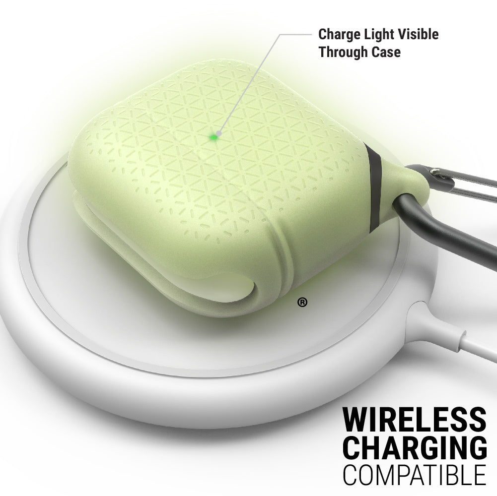 catalyst airpods gen 3 vibe case carabiner glow in the dark on top of a waireless charger text reads charge light visible through case wireless charging compatible