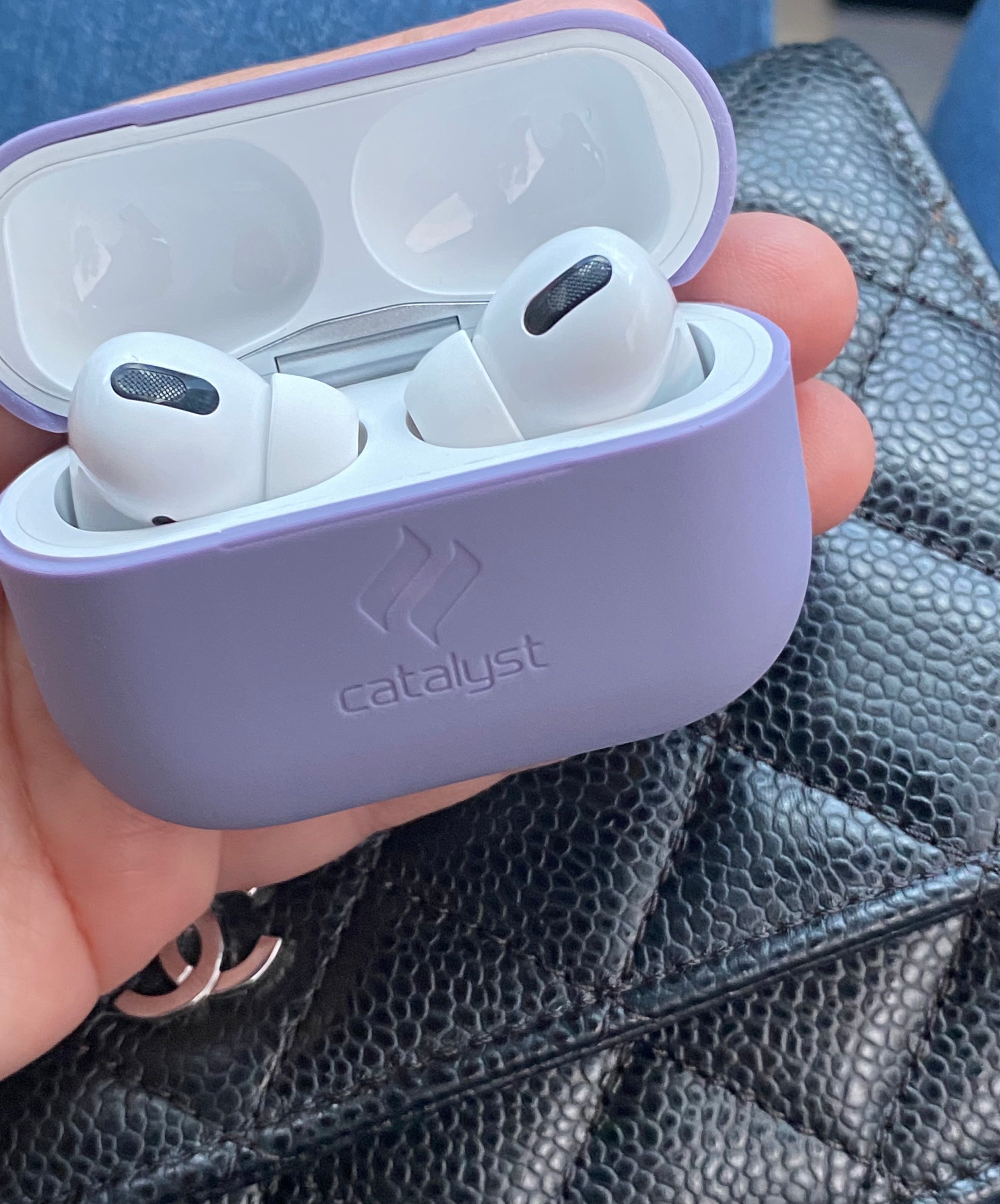 Catalyst airpods pro gen 2/1 slim case showing  airpods inside-the case in lilac colorway