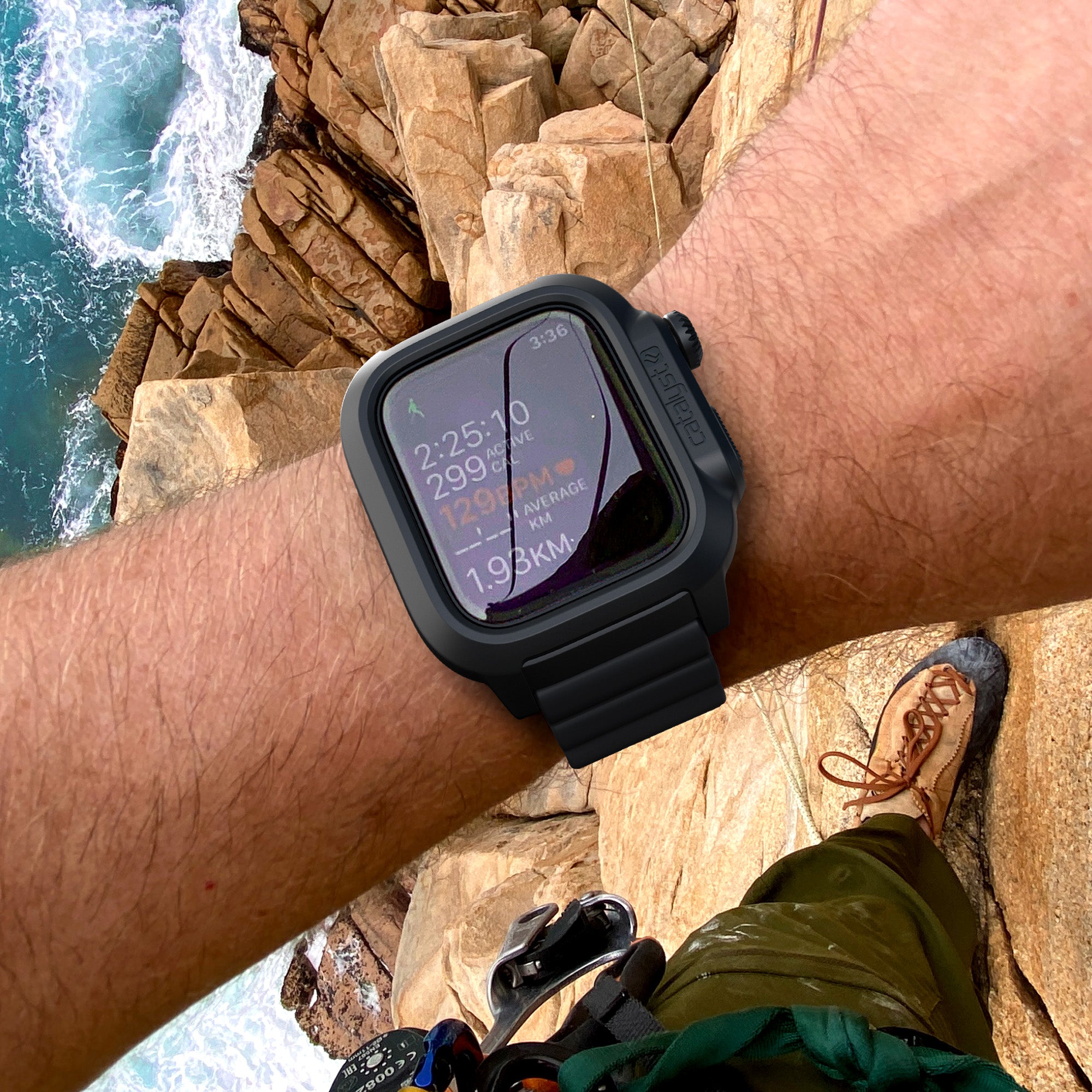 catalyst apple watch series 9 8 7 45mm total protection case band showing a man on the cliff wearing an apple watch with a catalyst case