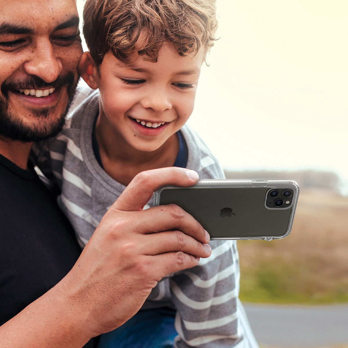 catalyst iPhone 11 series impact protection case father and son using iPhone 11 pro max with clear case