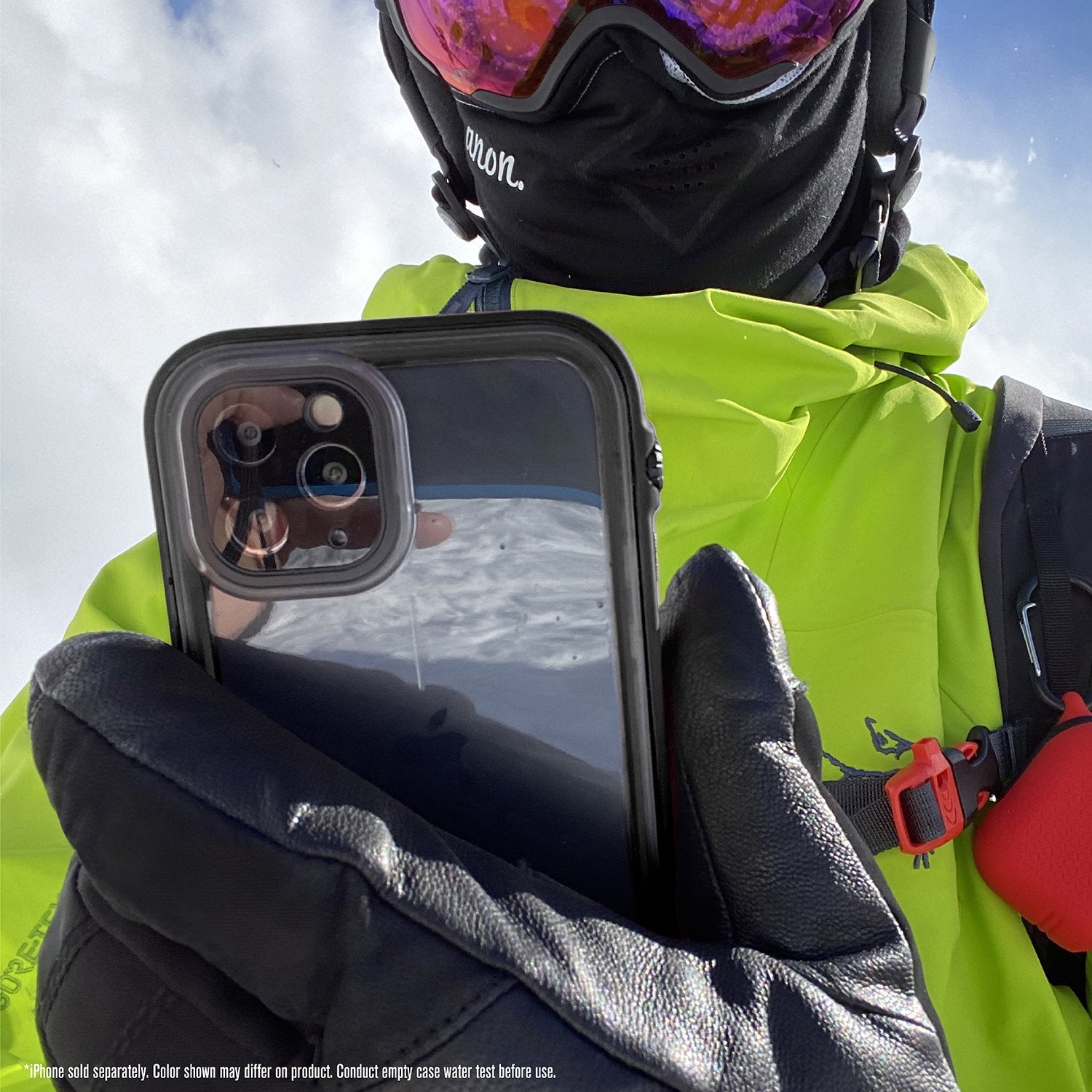 Catalyst iphone 11 pro max waterproof case showing the man holding the phone with case in stealth black colorway