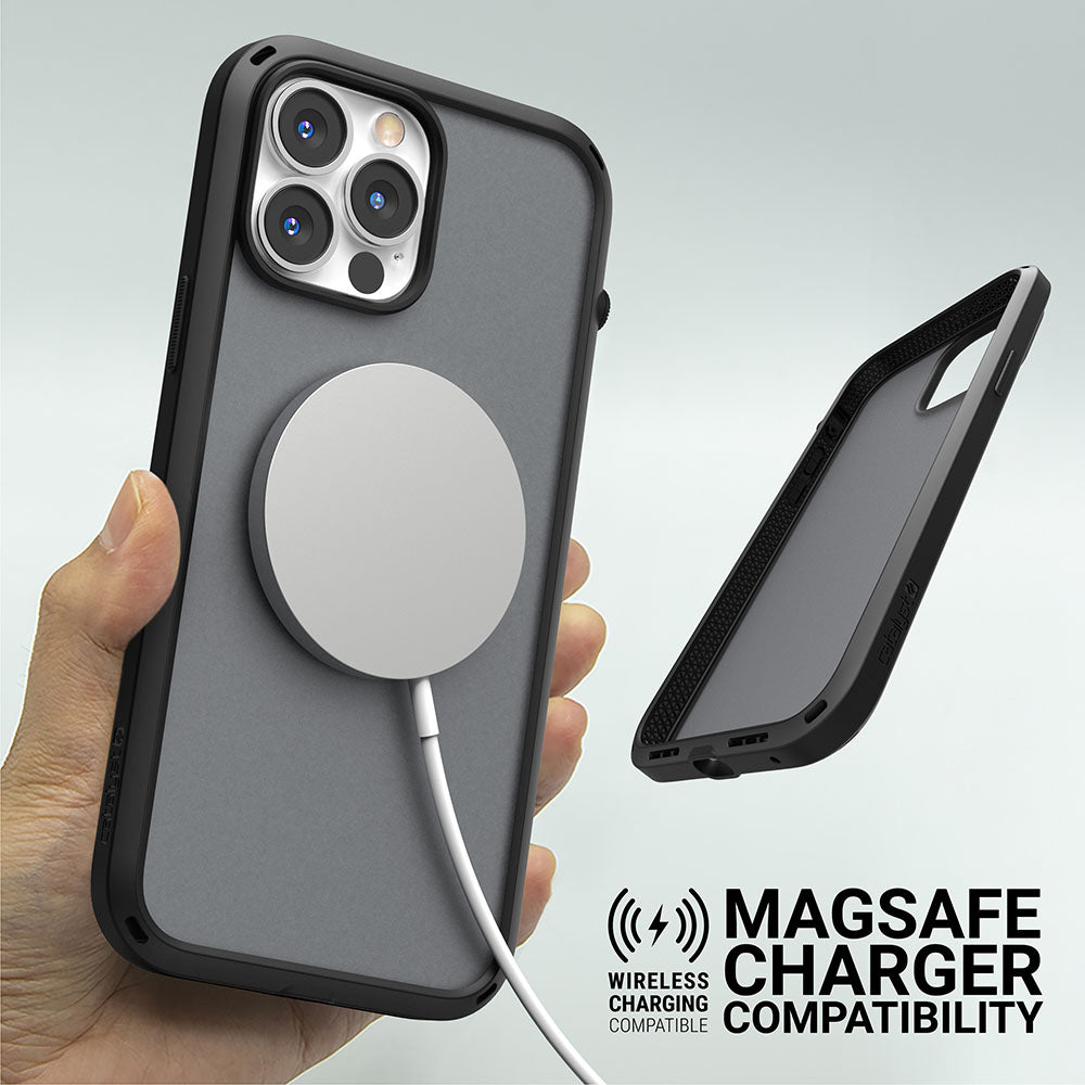 Catalyst iphone 13 series influence case in iphone 13 pro max in stealth black with magsafe charger text reads wireless charging compatible magsafe charger compatibility