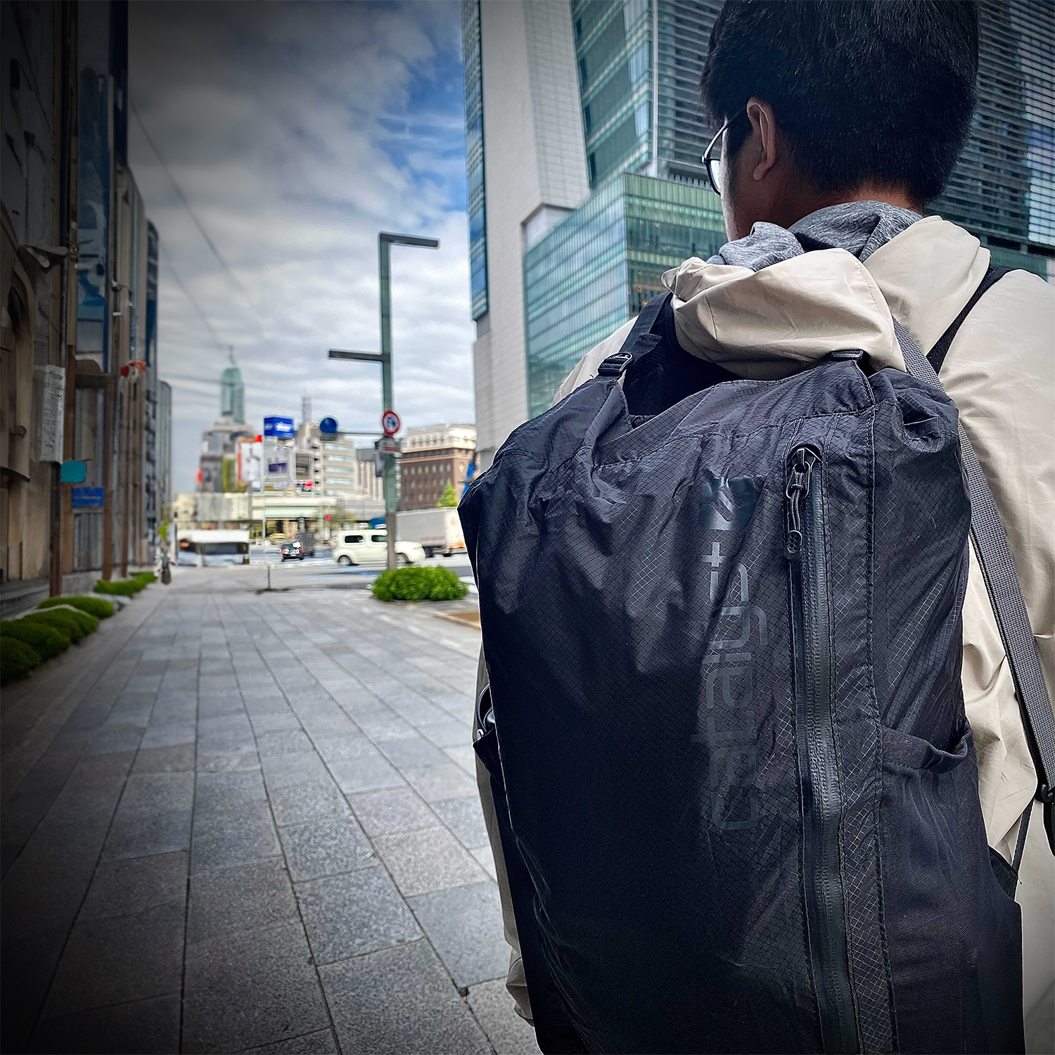 catalyst waterproof 20l backpack man in the city with the backpack