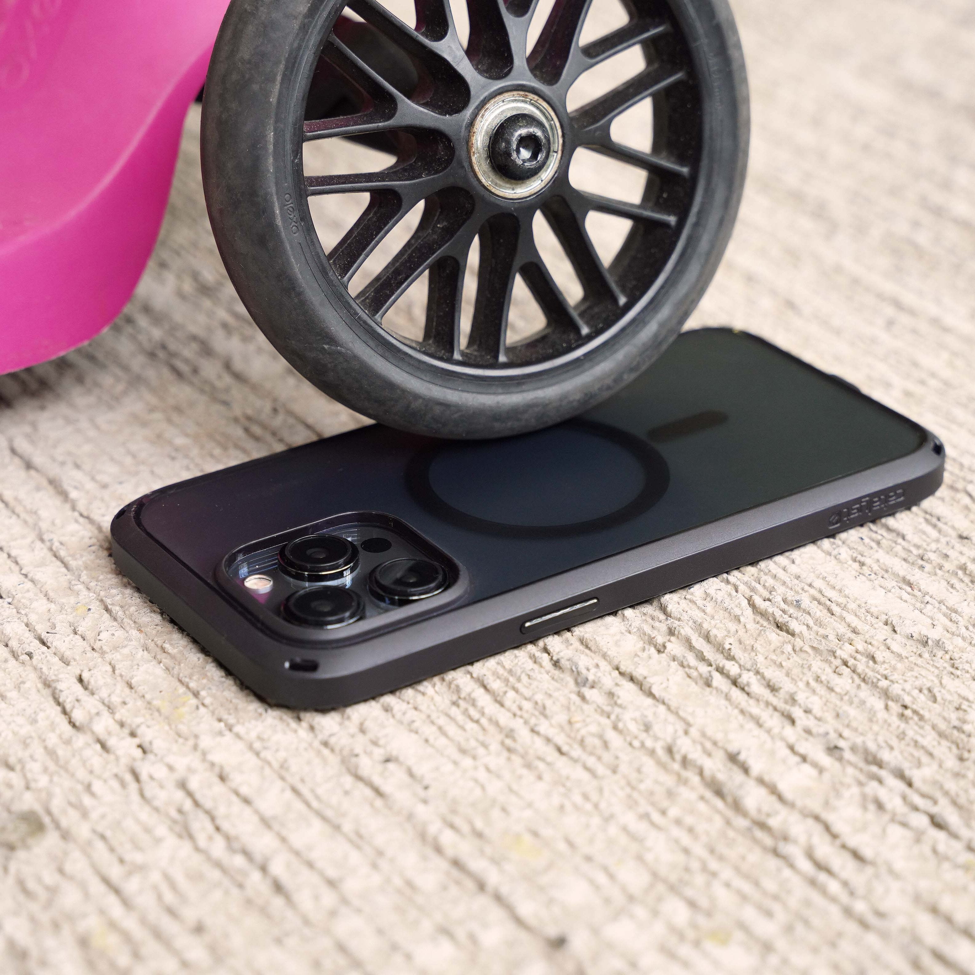 iphone drop proof case magsafe compatible black run over by wheel of a toy